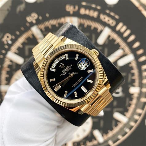 gold rolex day date black dial|rolex day date baguette bezel.